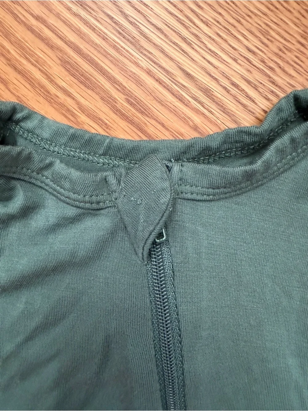 Rarely worn Kyte Baby zipper romper. 6-12 months. Color Pine